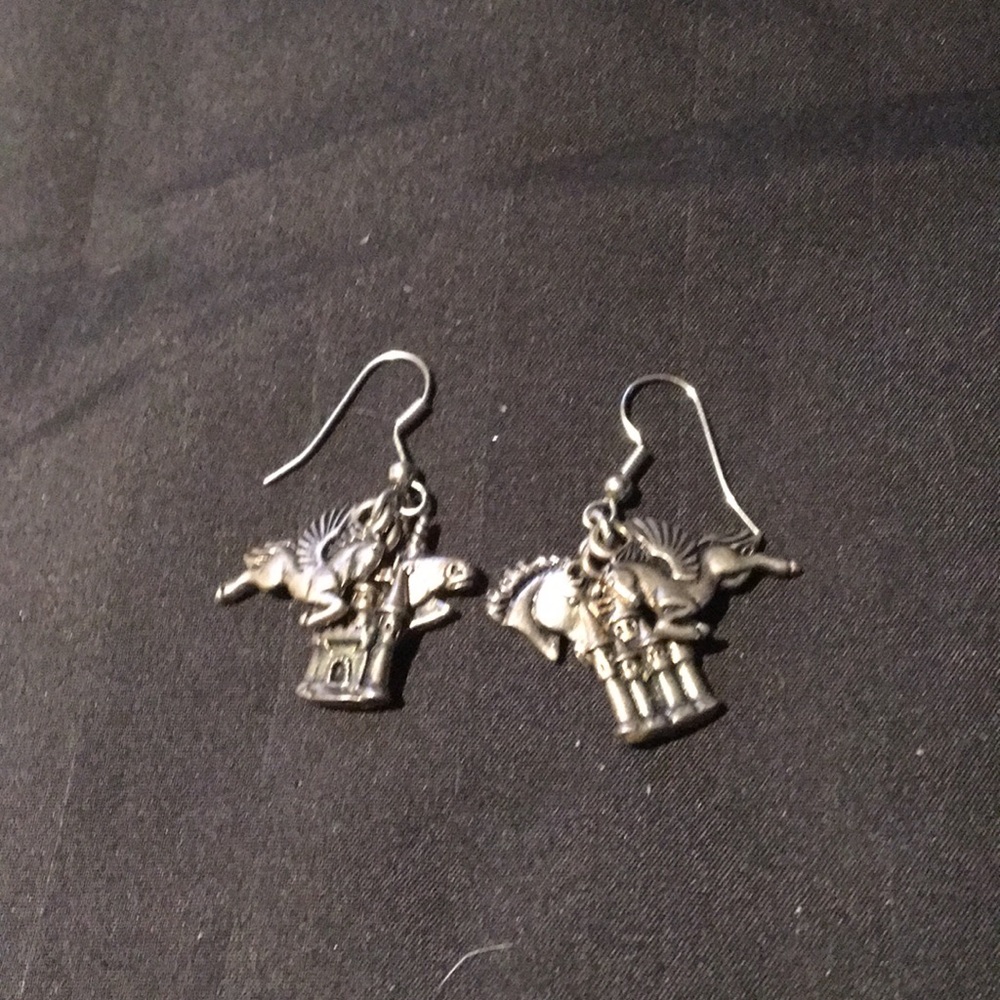 “Charmed” whimsical pierced drop earrings.